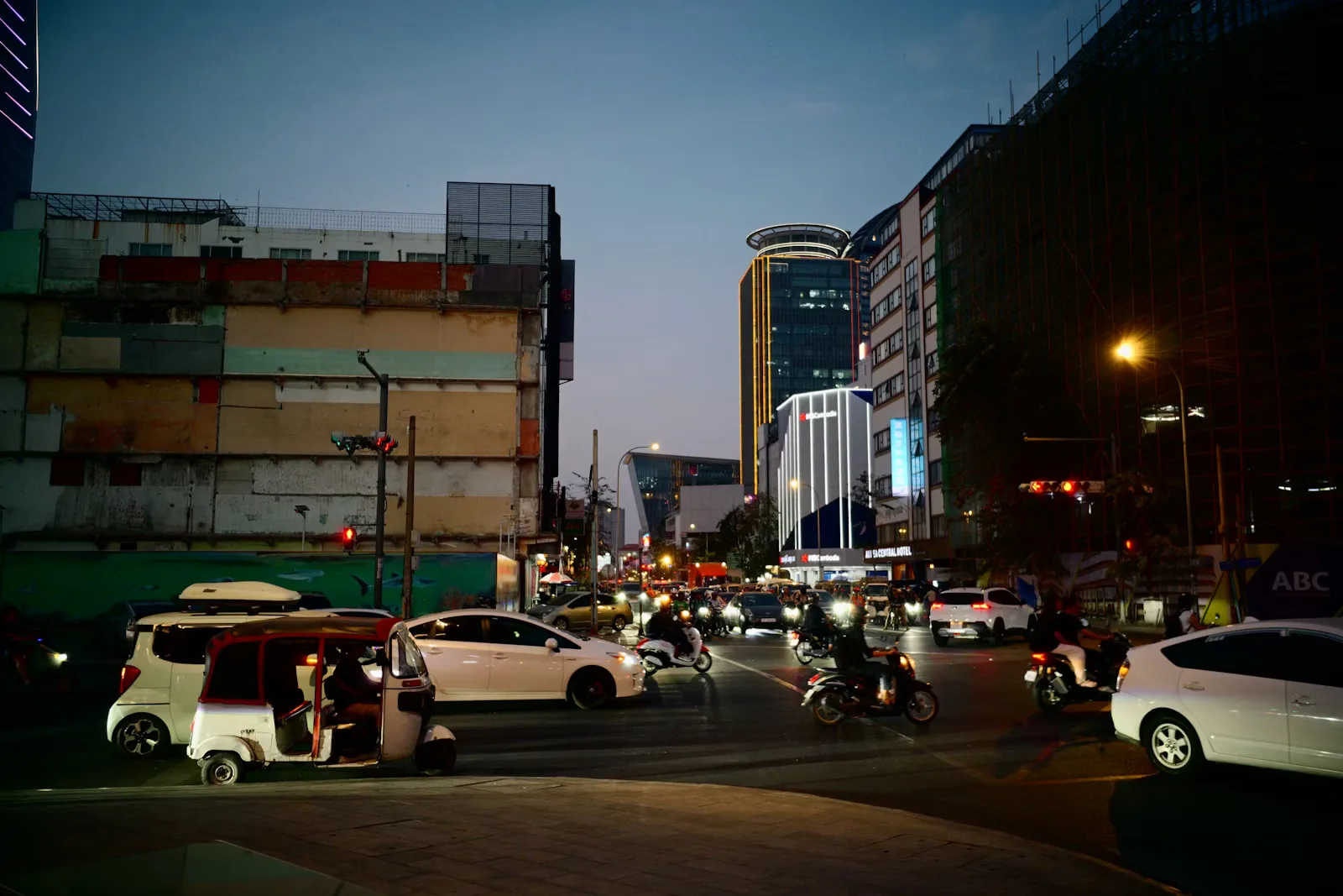 City traffic at dusk, representing mobility operations and service pressure.