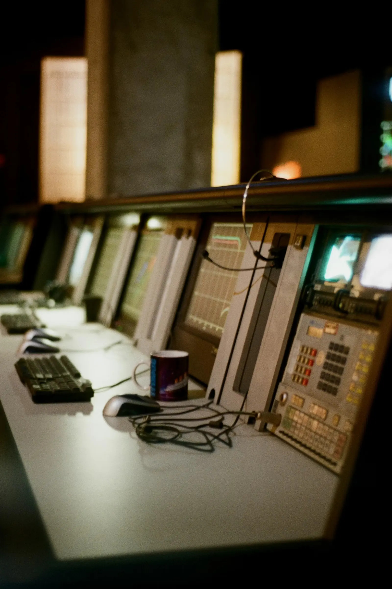 A control room with multiple screens, representing monitoring and operational decision making.